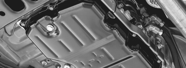 Oil Pan Fastened to a Car Using Patented Automotive Technology